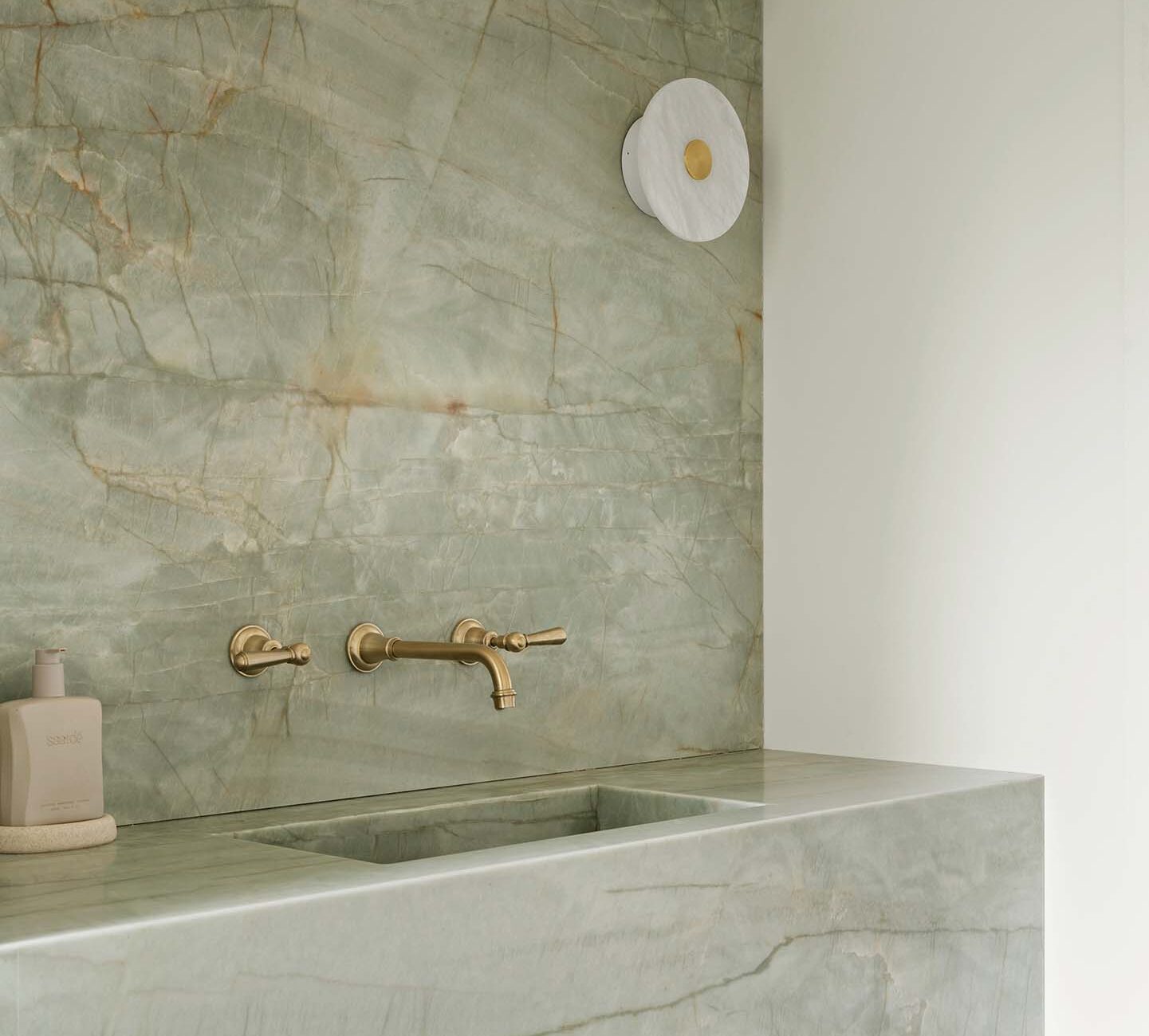 Stunning quartzite bathroom with integrated stone basin