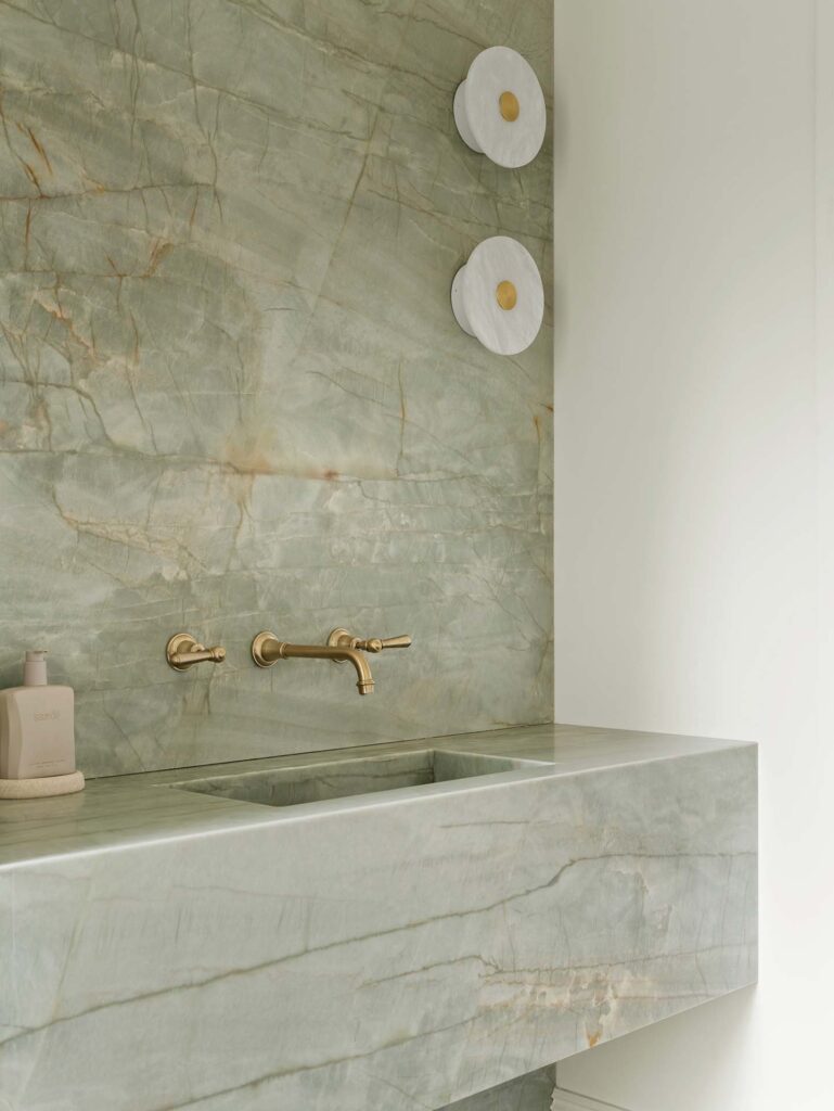 Stunning quartzite bathroom with integrated stone basin